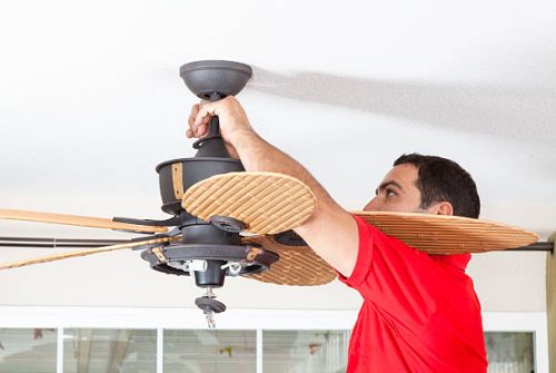 men-installing-ceiling-fan
